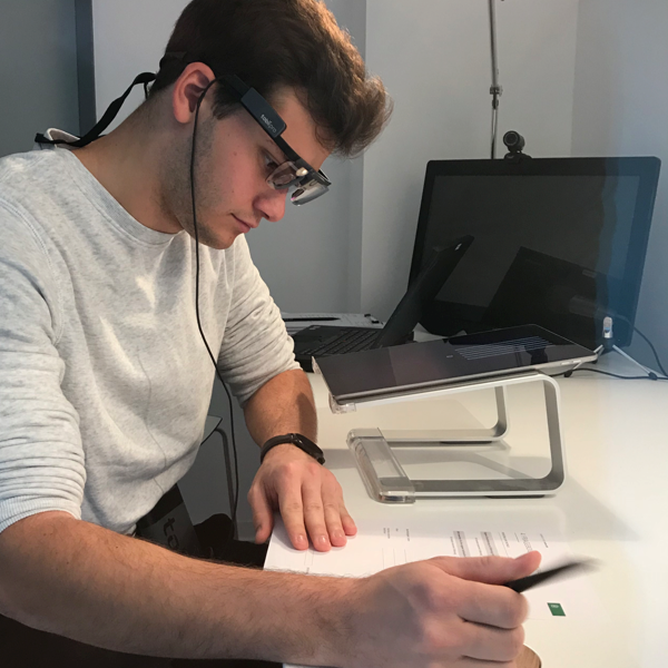 Our colleague Daniel filling out a user test with eye tracking glasses