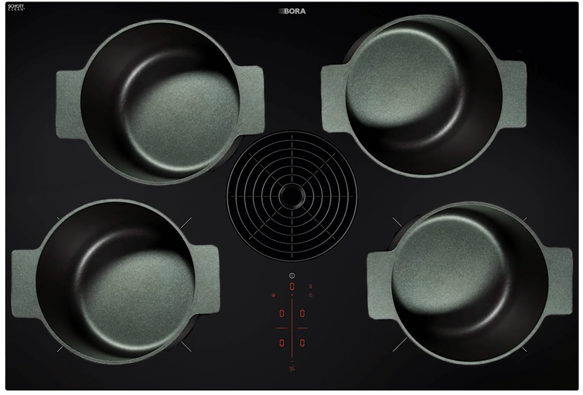 The BORA Pure hotplate with various pots, photographed from above.